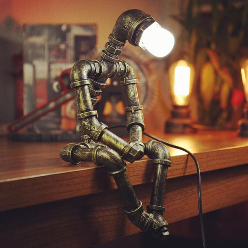 Nuvion | Bold Iron Robot-Inspired Table Lamp